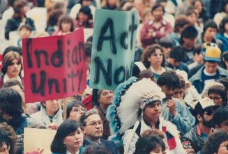 An estimated 3,500 native Indians and supporters crowd the lawns of Queen's Park yesterday for a rally demanding full rights for native peoples. They (...)