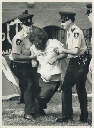 Campus arrests: Police arrest a student, along with 11 others, for trespassing after a group erected tents at the University of Toronto to protest the Economic Summit