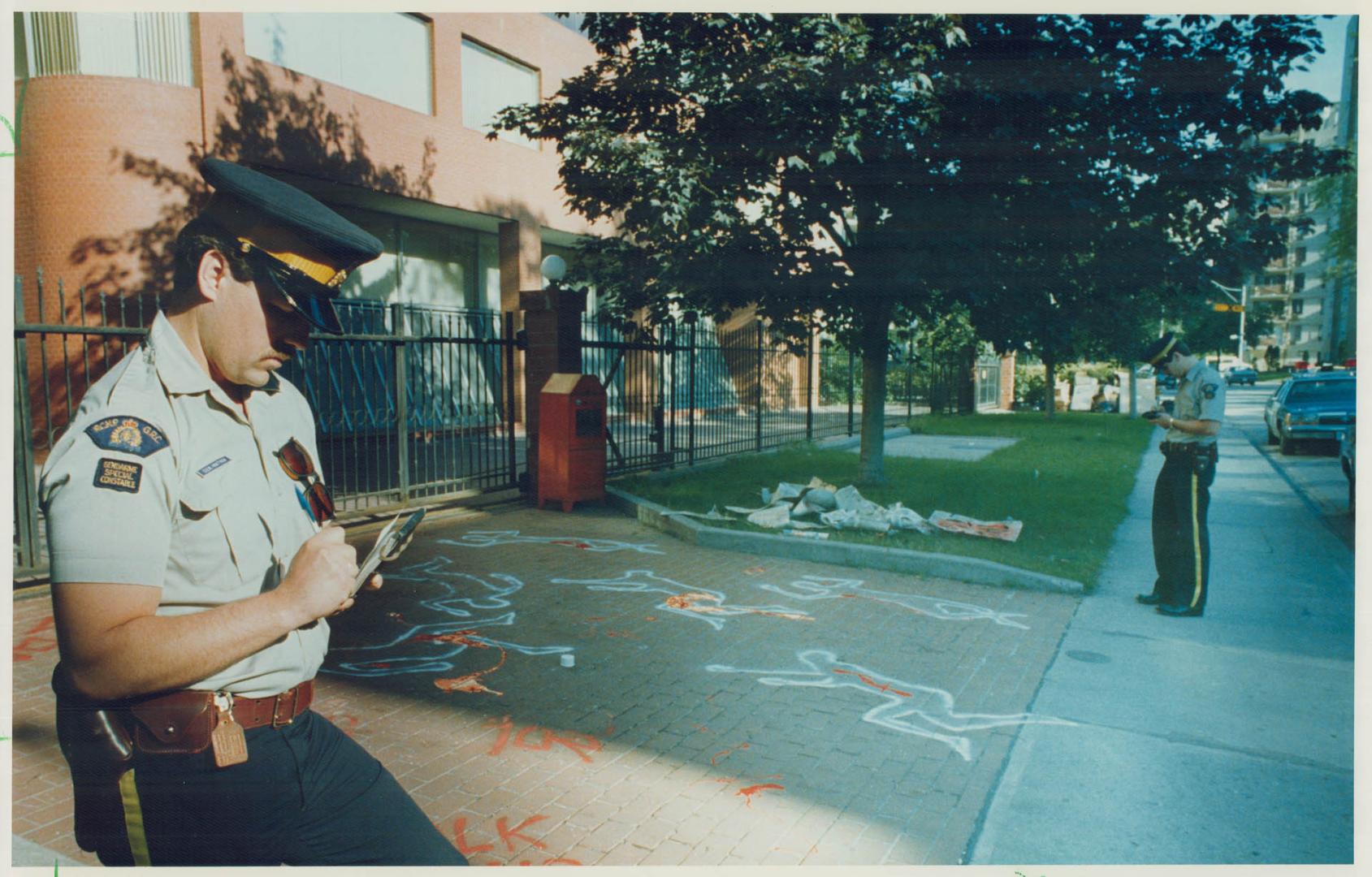 Outlined figures smeared with red paint, representing the slain students of Tiananmen Square, were stencilled in front of the Chinese consulate on St.(...)