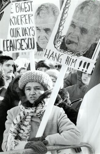 400 Demonstrate: Local Romanians gather in Nathan Phillips Square yesterday for a rally in which they called for more help from Canada for their homeland