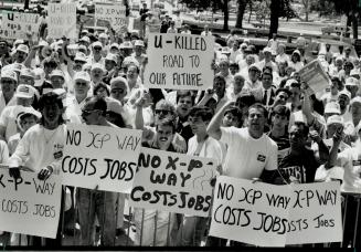 Angry crowd: Demonstrators at Queen's Park yesterday demand that the government restore financing for an expressway between Stoney Creek and Ancaster