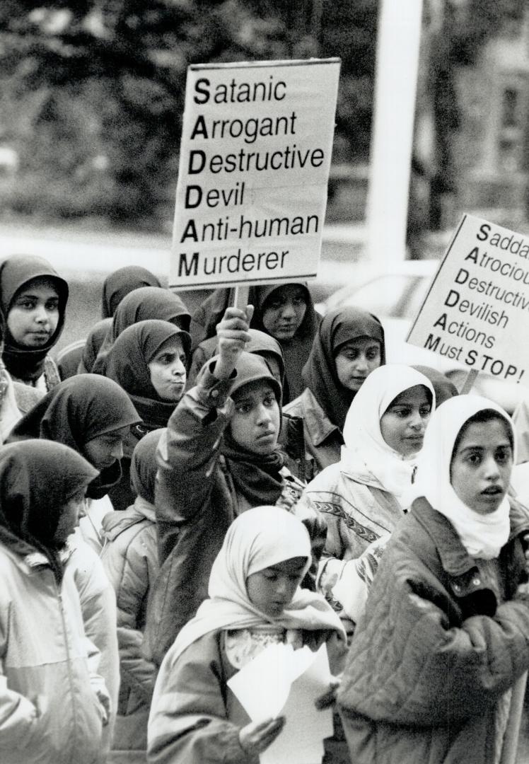 Rally for Iraqis, Members of the Council of Islamic Guidance march to Nathan Phillips Square yesterday to call for an end to Iraqi leader Saddam Hussein's regime