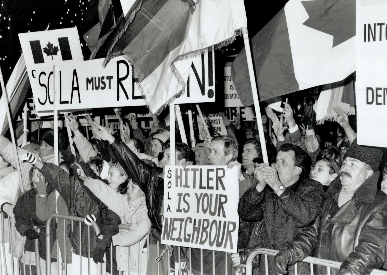 Angry protesters: Waving placards, Canadian and Serbian flags, about 3,000 coverge on Queen's Park last night damanding the resignation of LIberal MPP John Sofa (Mississauga East)