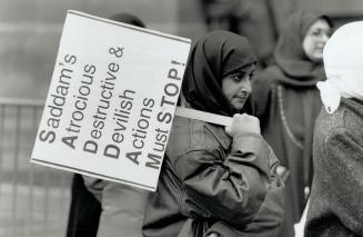 Rally for Iraqis, Members of the Council of Islamic Guidance march to Nathan Phillips Square yesterday to call for an end to Iraqi leader Saddam Hussein's regime