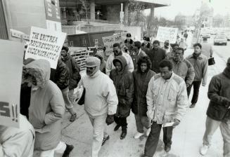 Marchers protest Ethiopian shootings, About 50 protesters march from Queen's Park to the U