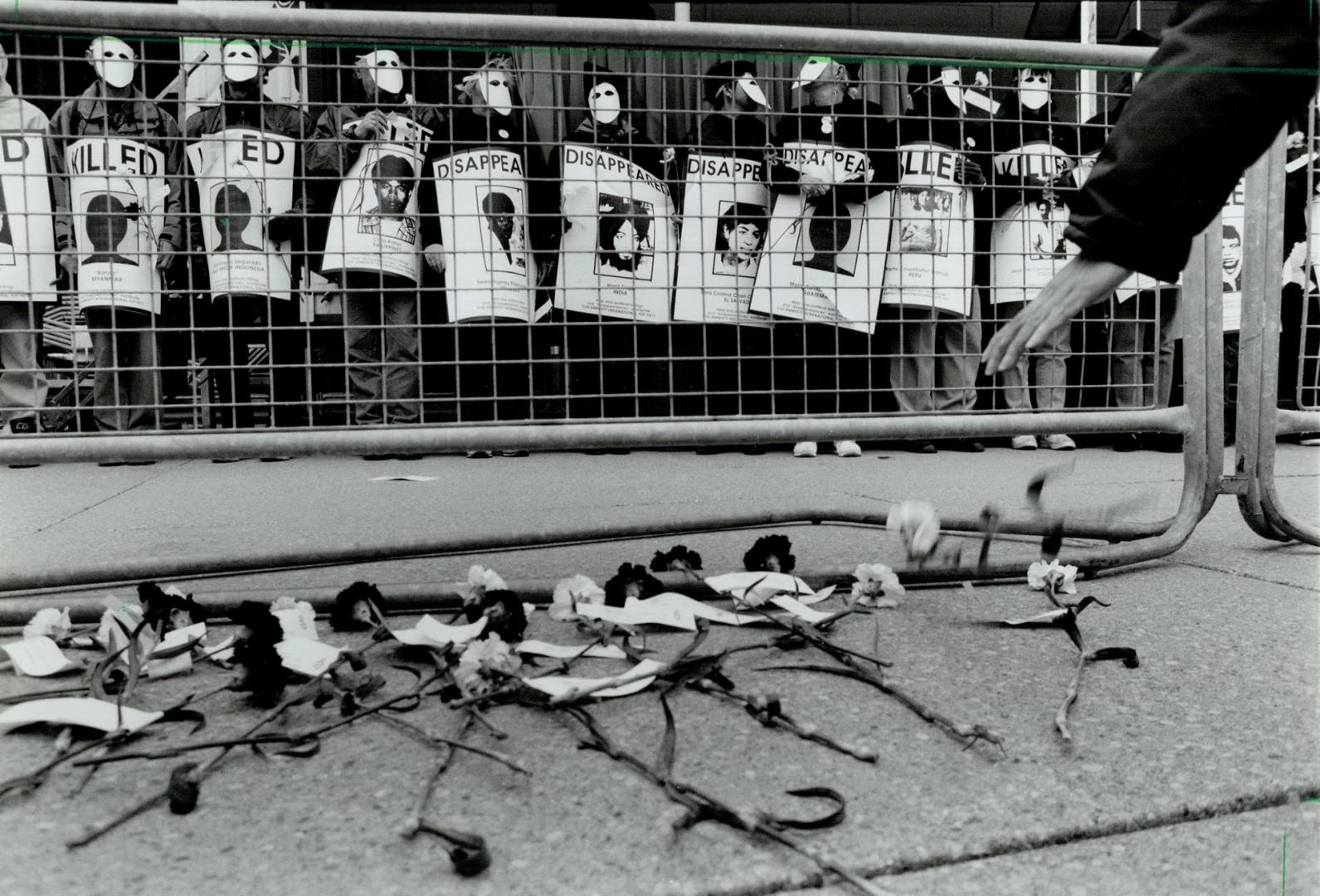 Masked participants at an Amnesty International event