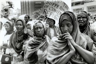 Somalis at Immigration Canada offices, Mulki Mohamed (right)