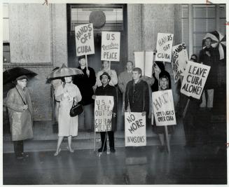 Pickets at U.S. Consulate on University Ave., Group of marchers protested announcement U.S. action on Cuba