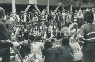 Student walkout protests spending ceilings, Singing students loll on the front lawn of Keiller Mackay High School in Etobicoke after they walked out t(...)