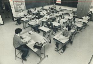 Boy in grade 8 takes charge of class, At Kingsmill Secondary School on Royal York Rd