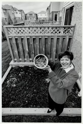 Doing her bit: With her backyard compost heap, Marybeth Akins is one of the new conscientious consumers