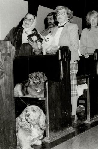 Furry flock receives blessing, Parishioners and pets