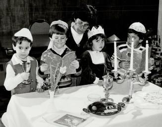 Remembering a sacred night, Students of the Hebrew school of Temple Sinai on Wilson Ave