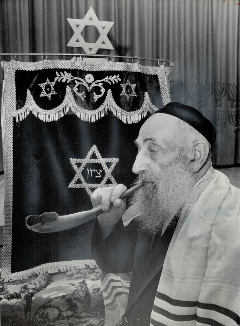 A New Year Begins, Harry Applebaum, who's 99, blows the traditional shofar (ram's horn) at Baycrest Geriatric Centre to mark Rosh Hashanah, the beginning of Jewish Year 5729