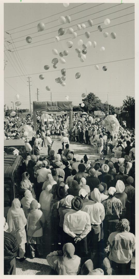 Looking up, Thousands of Sikhs turned out Sunday to help raise some of the $2