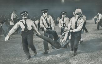 Police drag off soccer fan who stormed onto field at CNE stadium