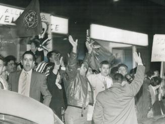 Rioters outside the office of the portuguese consul on Bay St