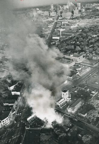 Smoke signal from a tormented city