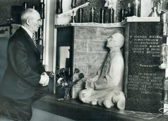 Visiting Toronto from his native Poland, Franiszek Gajowniczek, 74, pays homage to Saint Maximilian Kolbe at St