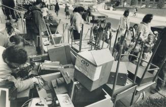 Garage sale with a message. The Toronto Board of Education offers some of its classroom castoffs yesterday at a garage sale on the steps of its admini(...)