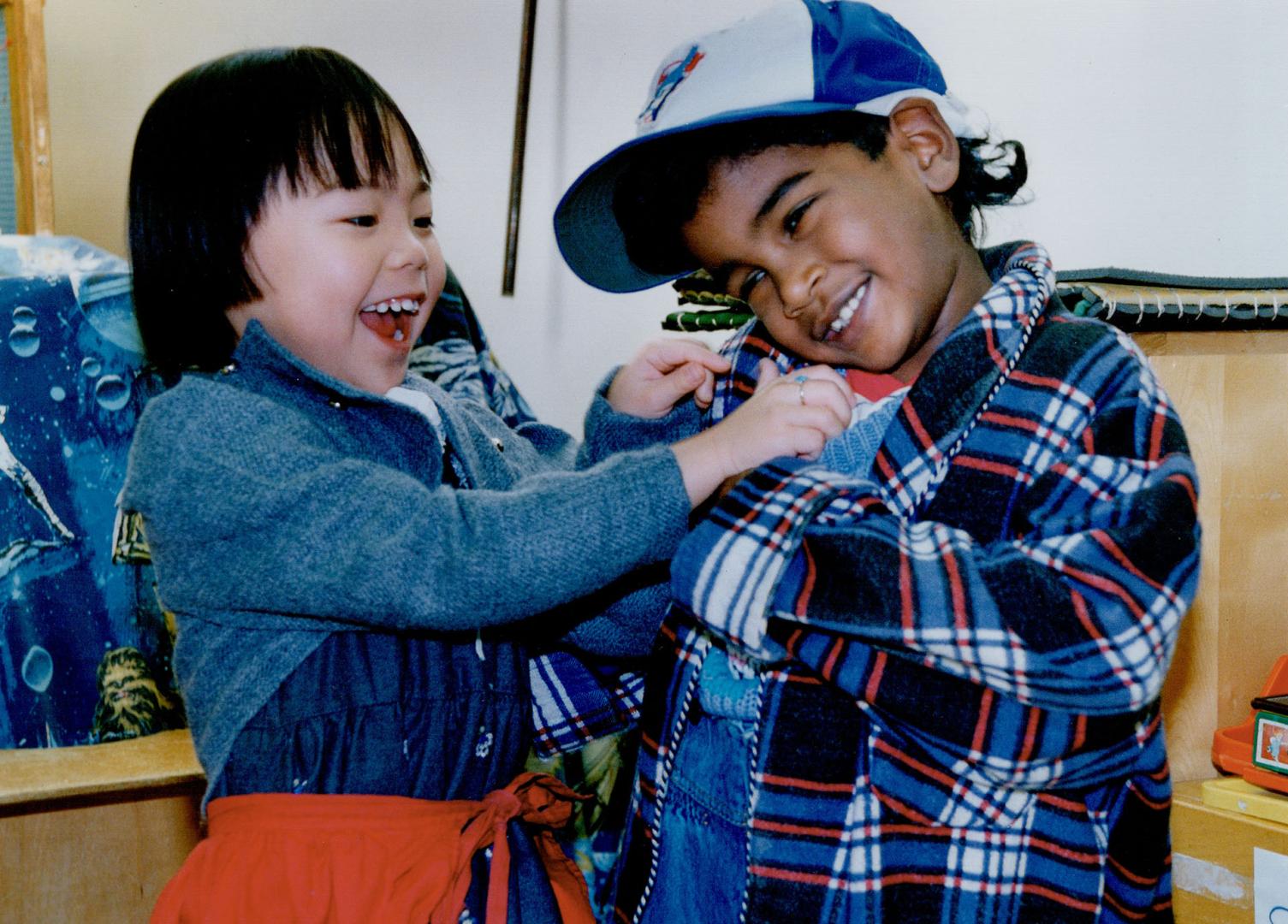 Profit Versus Non-Profit: Fiona Man and Trevor Arjune attend Children Are VIPs Day Nursery, a privately owned commercial day-care centre in Richmond Hill, threatened by new funding policy