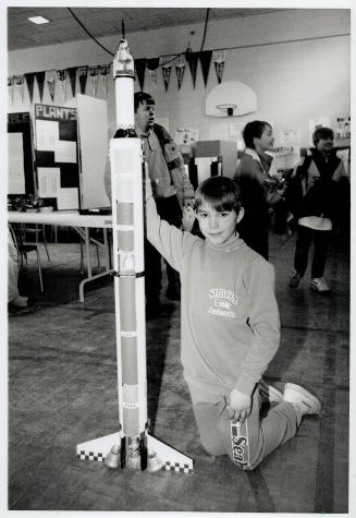 Model rocket, Adam Kalicak, 9 of Elizabeth Simcoe Public School, shows his home-made Saturn rocket at the Scarborough Area 8 Science Fair last week at(...)