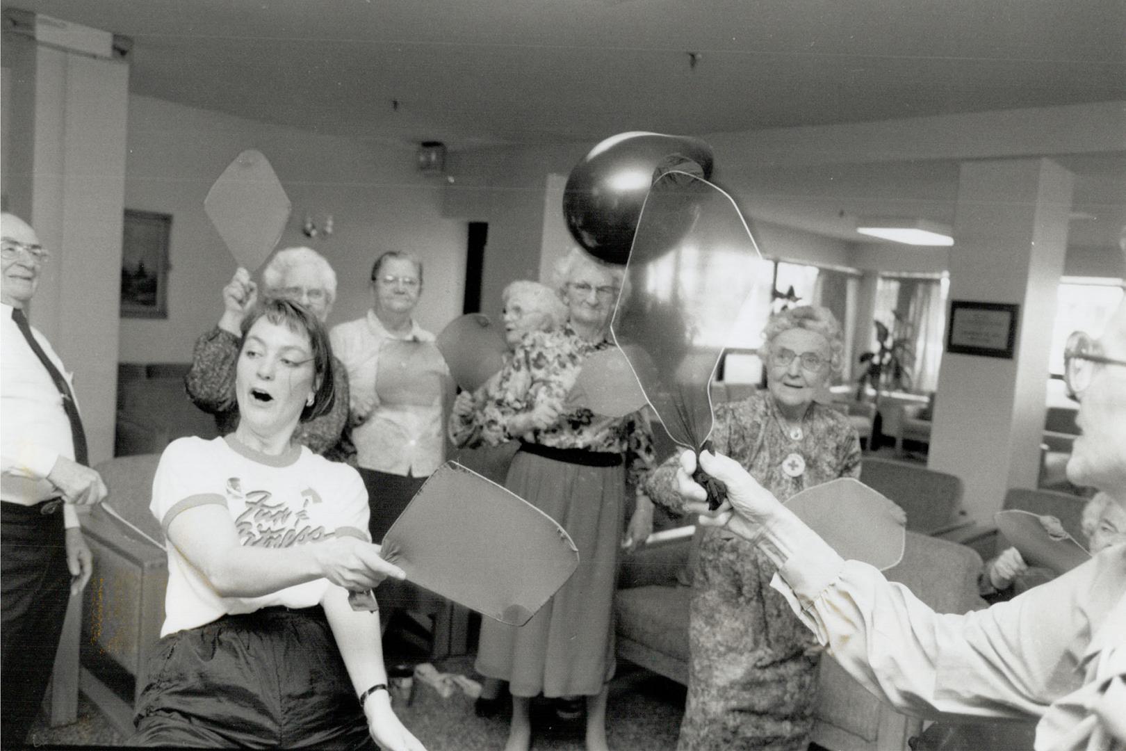 Healthy antics: Carol MacDonald, left, leads a group of seniors in an easygoing fitness program at the Salvation Army's Arthur Meighen Retirement Residence