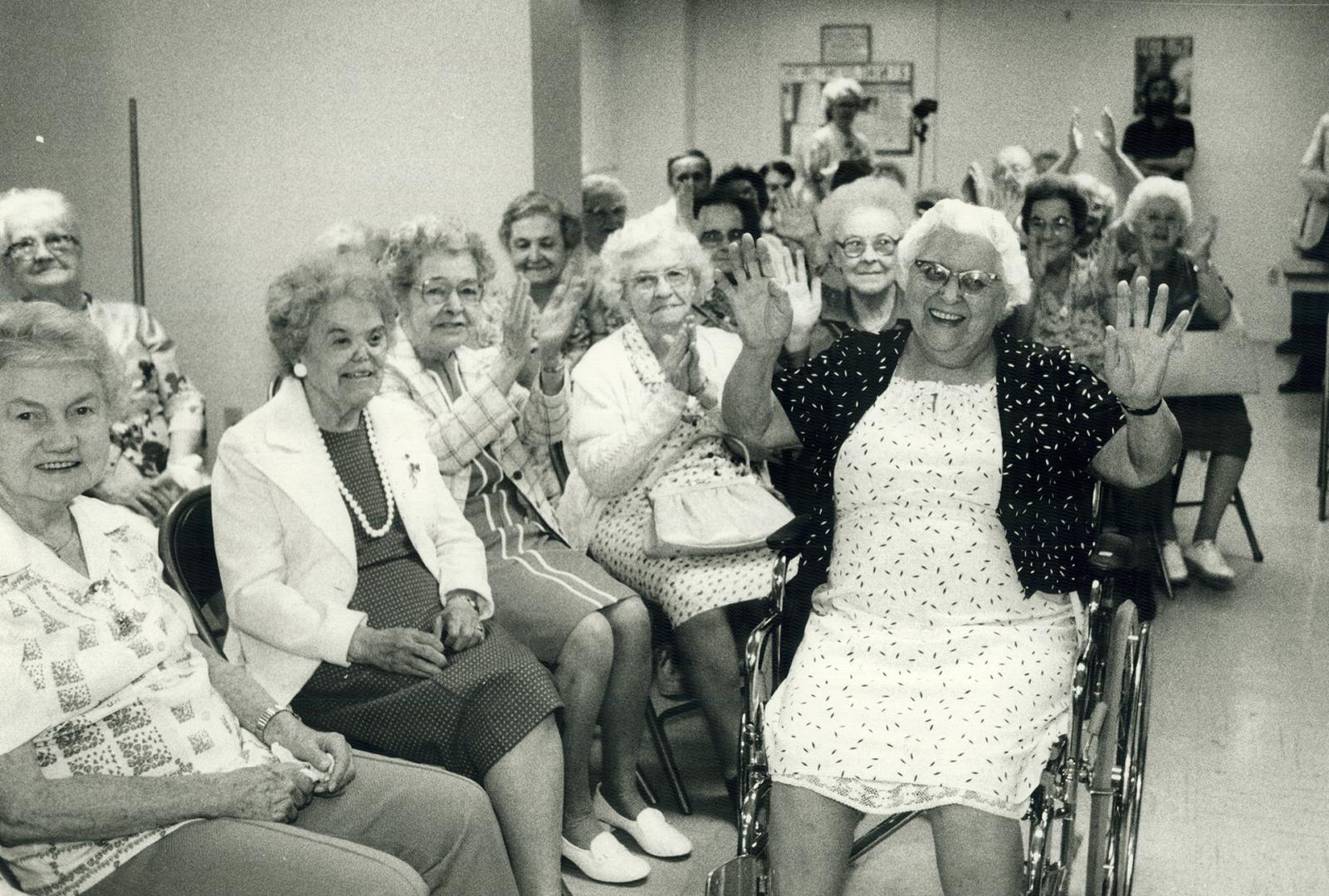 We did it! Jean Hanna, 79, surrounded by other seniors in her High Park Ave