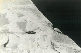 The U.S. icebreaker Bristol Bay opens a path through 18-inch-thick ice to Lake Erie