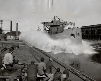 First of three lake tankers being built at Collingwood, the Imperial Collingwood is shown as she took to the water Saturday in a perfect launching. Th(...)