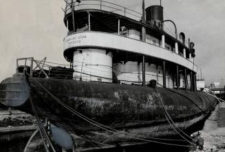 Last of the whalebacks: Liberal Leader Andrew Thompson ridicules suggestions that the freighter, John Ericson, shown here in Toronto drydock