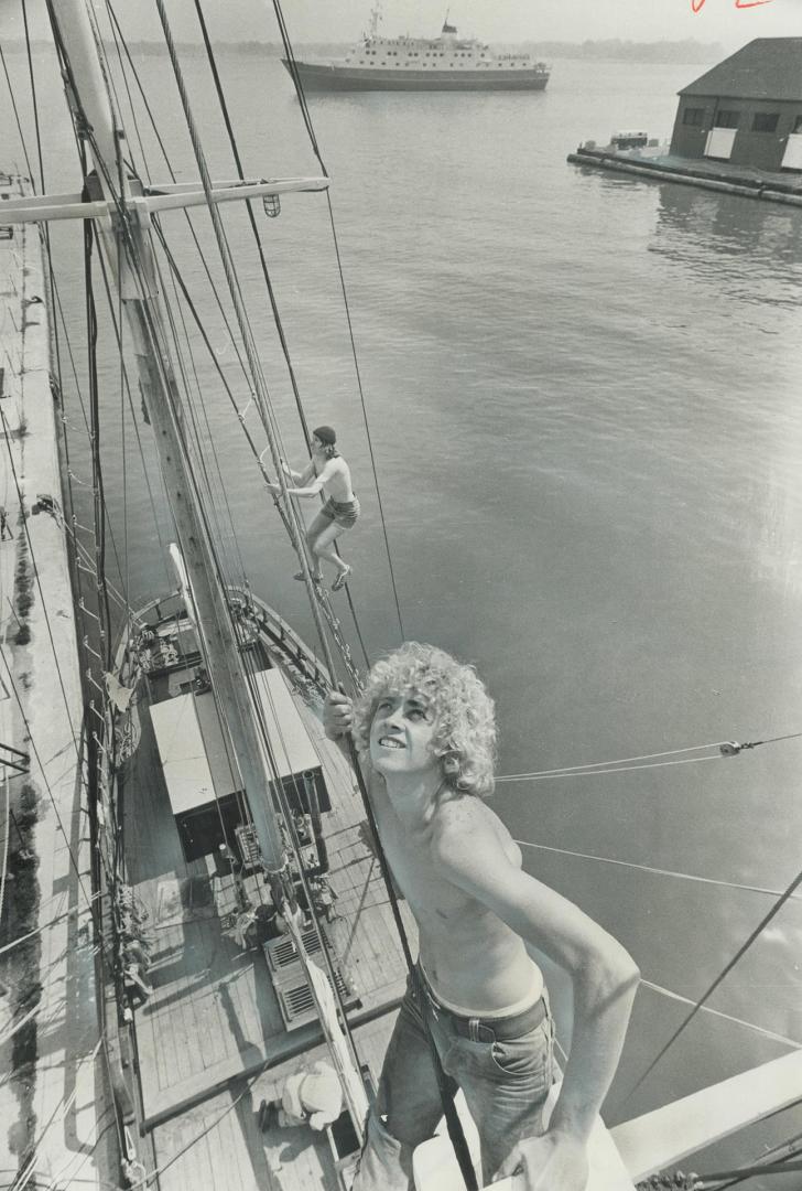 The days of sail live on, Two officers of the training brigantine Pathfinder, moored in Harborfront near York St