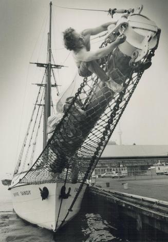 Shipshape for the season, Crew member Lee Cruickshanks works on the tip of the bowsprit of the Empire Sandy yesterday, getting the vessel shipshape fo(...)