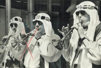 Oriental band, composed of Shriners from Hamilton, play outside Queen Elizabeth Building as 350 Canadians were inducted into the international organiz(...)