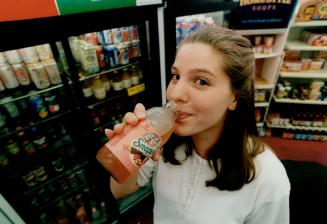 Heather Watts drinks Snapple