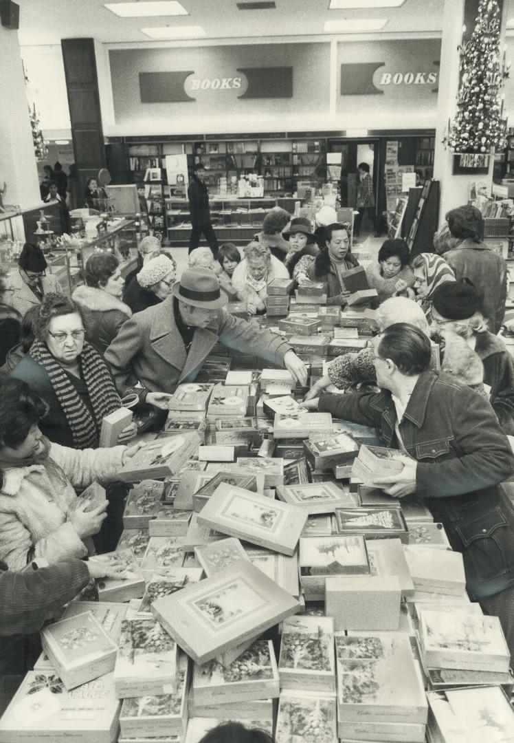 Christmas Cards at half price were selling well today in Simpsons and other stores, holding their last Boxing Day sales