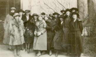 Toronto Public Library staff in front of Central Library, College Street, northwest corner of St