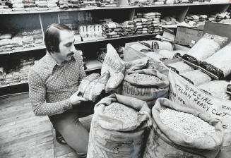 Johnny Raia checks variety of beans at Pasquale bros