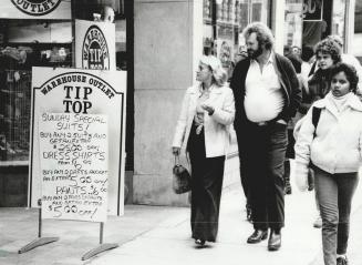 Business sunday: Yonge St. merchants Fairweather (above), Fashion Bazaar (right), and Tip Top Tailors say Sunday is their busiest day