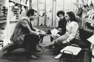 Business sunday: Yonge St. merchants Fairweather (above), Fashion Bazaar (right), and Tip Top Tailors say Sunday is their busiest day