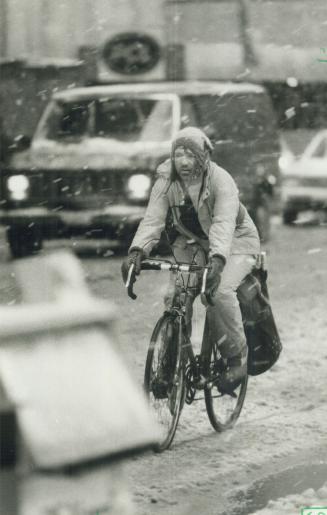 Neither snow nor rain . . . As miserable as it was, there were thousands whose jobs forced them outside into slip-slide-sludge city. Mall carriers, fo(...)