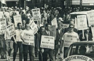 Opposition to injunctions is theme as unionists march in labor day parade to the CNE