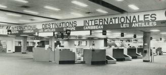 Overseas wickets at Toronto International Airport are deserted as all of the European airlines and the big U