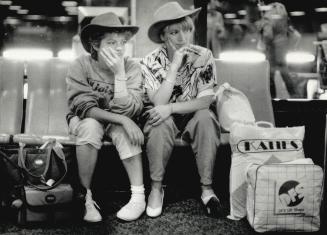 Grounded! After flying all the way from Australia, Dianne Abbott (right) and daughter, Sherry, 19, found themselves stranded at Pearson airport today.(...)