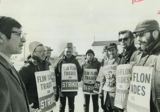 Striking machinist representative Jim Goodison (left) idled more than fudson Bay Mining and Smelting Co