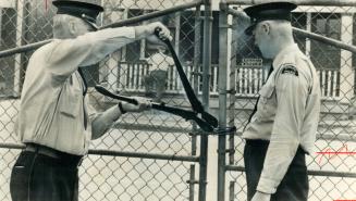 Stelco security guards open the gate at hilton works