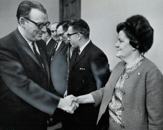 Meeting Delegation from Canadian Union of Public Employees, Ontario Treasurer Charles MacNaughton shakes hands with Grace Heartman, secretary-treasure(...)