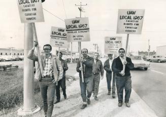 Picket lines such as this one at Douglas Aircraft in Malton last October would vanish from the Canadian scene if a special labor court were establishe(...)