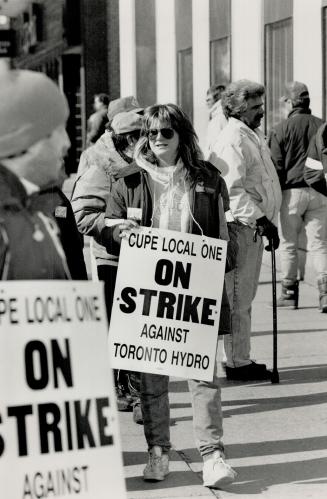 Empty Pockets: Hydro apprentice Bonnie Urry, on picket duty yesterday, says there's next to nothing of her pay left after she covers basic house and living costs