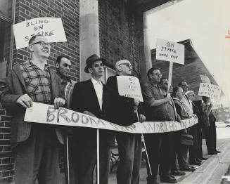 Blind pickets parade outside CNIB on bayview Ave